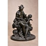 A French bronze group, the Education of Cupid, late 18th / early 19th century, the central figure of