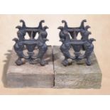 A pair of substantial cast iron and limestone mounted bootscrapes, second quarter 19th century,