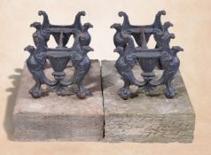 A pair of substantial cast iron and limestone mounted bootscrapes, second quarter 19th century,