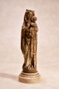 ϒ A French Gothic sculpted ivory group of the Madonna and Child, late 15th century, the Virgin