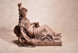 A sculpted terracotta model of Minerva reclining, Italian or French, 18th century, portrayed as