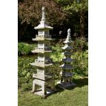 Two similar Oriental carved granite garden pagodas, 20th century, the larger example with four