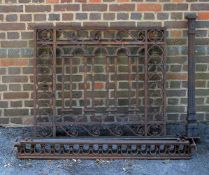 A quantity of decorative ironwork, probably elements of railings, late 19th century, comprising an