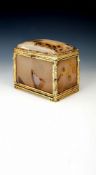 A 19th century agate casket with jewelled silver gilt mounts and accompanying agate caddy spoon,