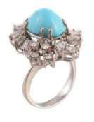 A 1970s turquoise and diamond cluster dress ring, the central oval cabochon turquoise within a