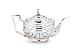 ϒ A George III silver oval tea pot by Solomon Hougham, London 11th October 1804-28th May 1805