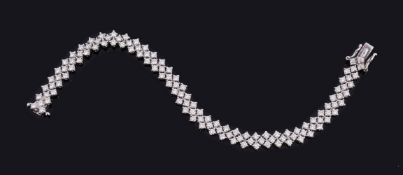 A diamond bracelet by Massoni, the articulated bracelet set with brilliant cut diamonds,