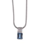 A diamond and aquamarine pendant by Boodles, the pendant with a step cut aquamarine with canted