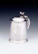 A Queen Anne silver slightly tapered tankard by John Rand, London 1705, Britannia standard, the