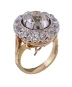 A late Victorian diamond cluster ring, circa 1890, the central old mine cut diamond weighing 2.57