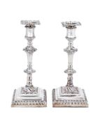 A pair of George III silver square candlesticks by William Abdy I, London 1769, the scones, knops