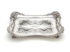 An American silver shaped rectangular serving dish and drainer by Tiffany & Co., import marked for