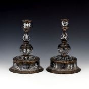 A pair of Limoges Revival enamel candlesticks, France, mid 19th century in 17th century style,