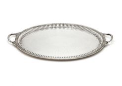 A late Victorian silver oval twin handled tray by Streeter & Co. Ltd, London 1900, the reeded loop