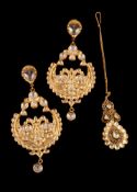 A pair of Indian diamond ear pendants (Jhumka), the pierced pear shaped panels with two kundan polki