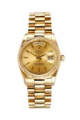 Rolex, Oyster Perpetual Day-Date, ref. 18038, an 18 carat gold bracelet wristwatch, no. 8703394,