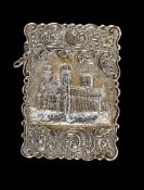 A Victorian silver shaped rectangular castle top card case by Yapp & Woodward, Birmingham 1853,