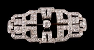 An Art Deco diamond brooch, circa 1930, the pierced geometric panel set with old European cut and