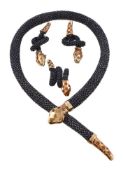 A steel, citrine and diamond serpent necklace, the snake composed of a formation of steel links, the