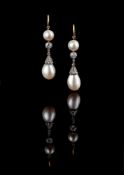 A pair of natural pearl and diamond ear pendants, the pear shaped natural pearl drops with rose