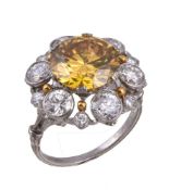 A 1960s diamond and treated yellow diamond cluster ring by Buccellati, the central brilliant cut