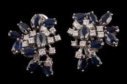 A pair of sapphire and diamond cluster ear clips, set with marquise cut sapphires and brilliant