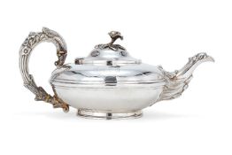 ϒ A George IV compressed spherical teapot by Charles Fox II, London 1829, with a rose finial