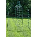 A painted wrought iron garden pergola, last quarter 20th century, the circlet top with eight