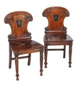 A pair of George IV mahogany hall chairs, circa 1825, in the manner of Gillows, 87cm high