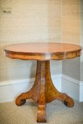 A circular amboyna and kingwood banded centre table in early Victorian style, second half 20th