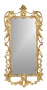 A carved giltwood rectangular wall mirror in George III style, 19th century, 111cm high, 53cm wide