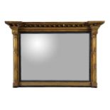 A Regency giltwood and composition overmantel mirror, circa 1820, 73cm high, 105cm