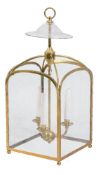 A gilt metal and glazed hall lantern, second half 20th century, of square section, the arched