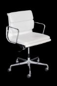 A cream and chromed metal leather desk chair, with label for Charles Eames, AUTHORISED ORIGINAL,