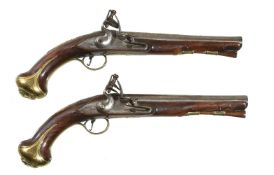 A pair of brass-mounted and walnut flintlock officer's pistols by I.SpittIe, mid 18th century, the 8