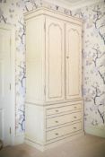 A grey and parcel silvered painted linen press, in French 19th century taste, late 20th century,