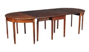 A mahogany D-end dining table, early 19th century and later, with drop leaf central section, and one