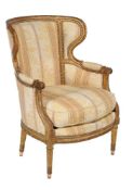 A giltwood and upholstered armchair in Louis XV style, early 20th century,