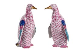 A pair of modern Herend models of penguins, blue printed, painted and impressed marks, 12cm high