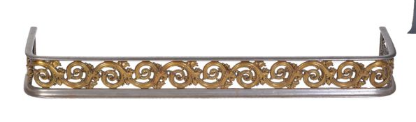 A Regency steel and brass fender, circa 1815, with a gilt scrolling foliate cast frieze, 13.5 cm