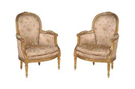 A pair of giltwood and composition armchairs, in Louis XVI style, early 20th century,
