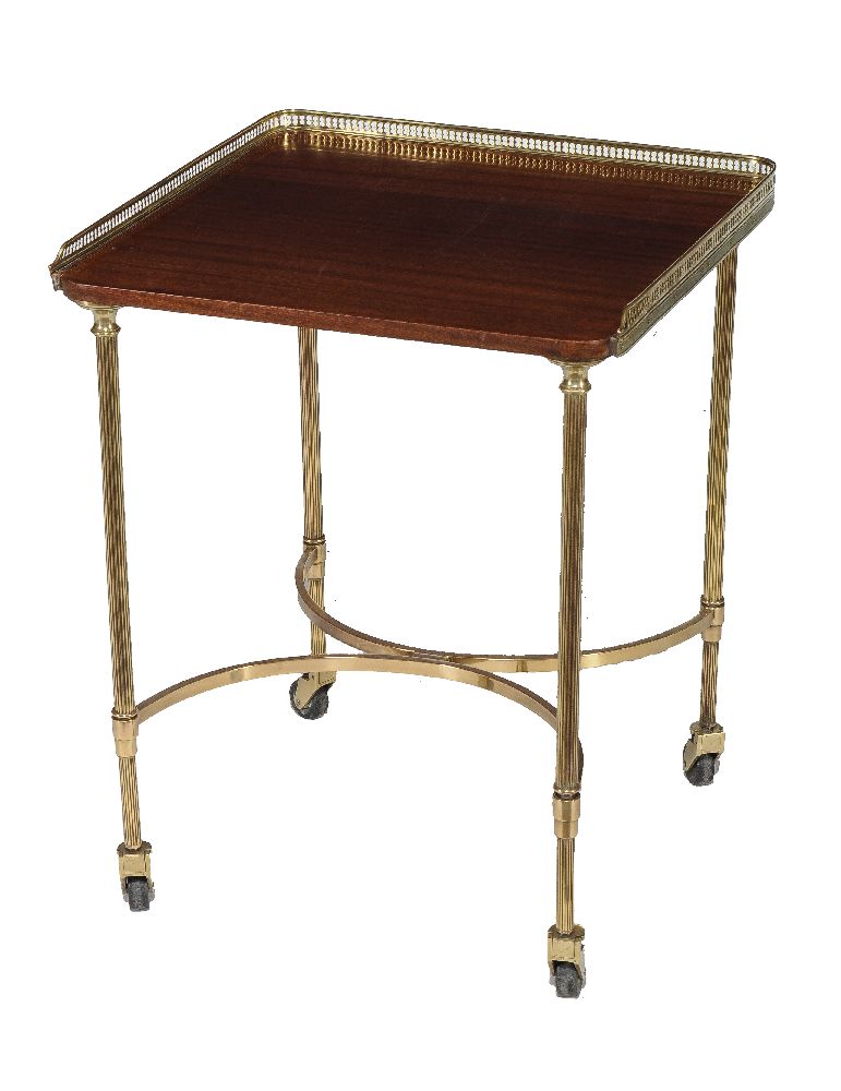 A mahogany and gilt brass occasional table, 20th century, possibly from Maison Jansen, with