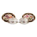 A pair of Coalport sauce tureens, covers and stands, circa 1820, in the Meissen style and painted
