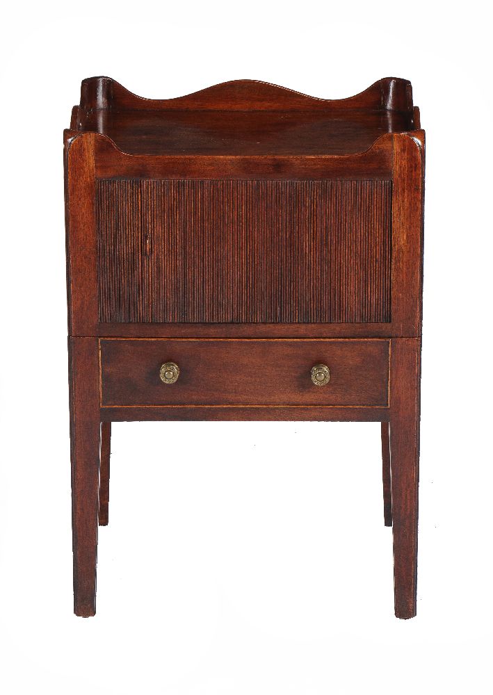 A George III mahogany night commode, circa 1790, the tambour compartment above a slide with lidded