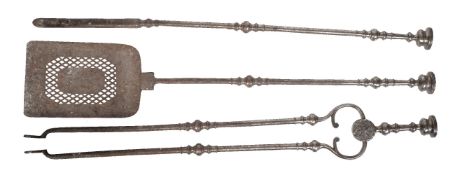 A set of Regency steel fire irons, circa 1815, comprising shovel, poker and tongs, all with