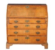 A George III walnut bureau, mid-18th century, with fitted interior with drawers and pigeonholes