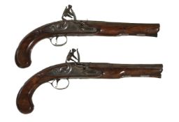 A pair of flintlock officer's pistols by BATE LONDON, circa 1775, the shell-carved walnut stocks