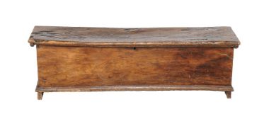 An oak and elm long coffer, incorporating 17th century and later elements, 38cm high, 130cm wide,