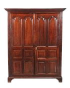 An early George III mahogany or ‘red walnut’ press cupboard, circa 1760, 187cm high, 154cm wide,