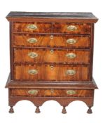 A George II walnut and oak chest on stand, circa 1730, 111cm high, 100cm wide, 56cm deep